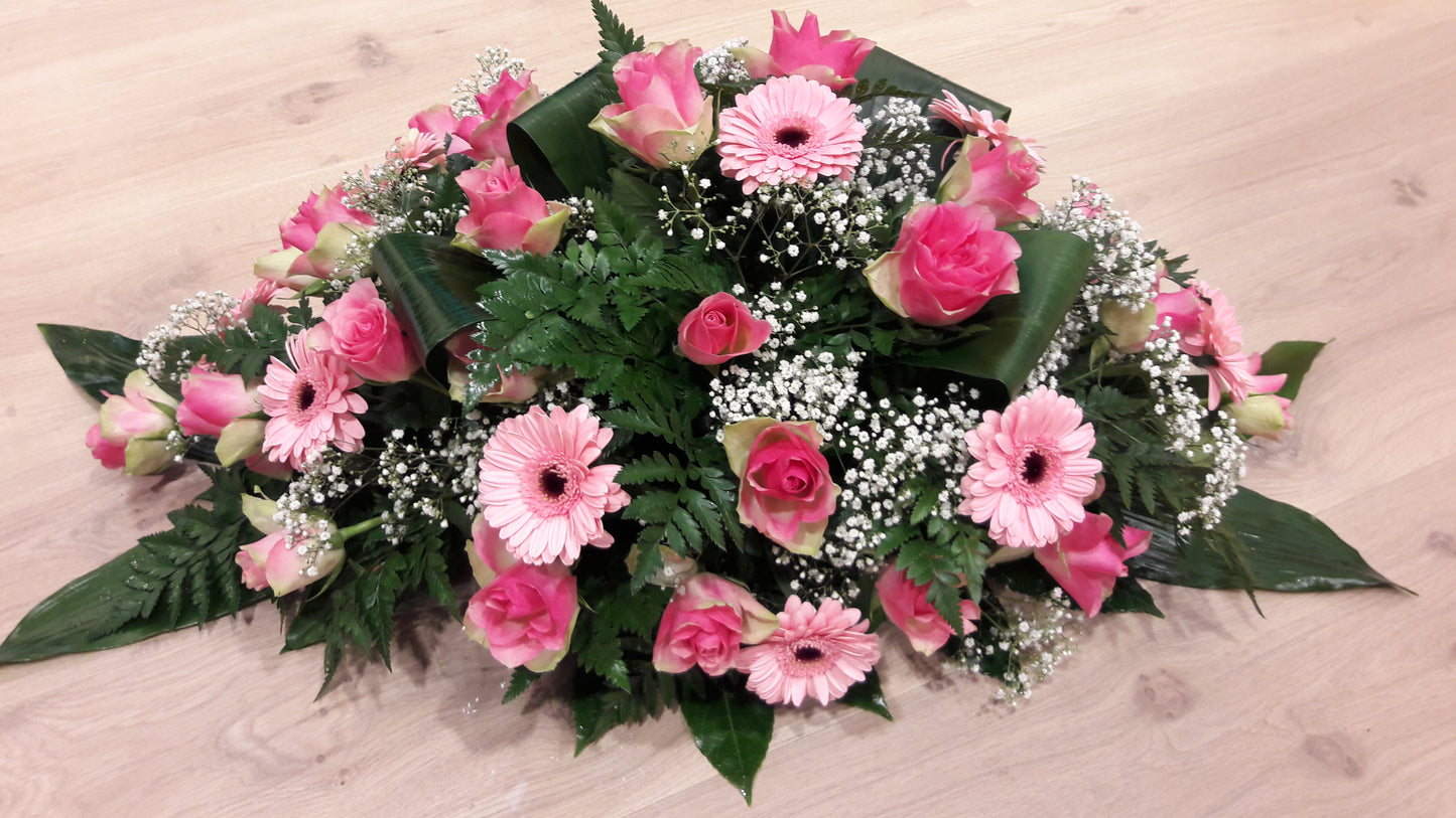 rouwstuk gerbera en roos roze